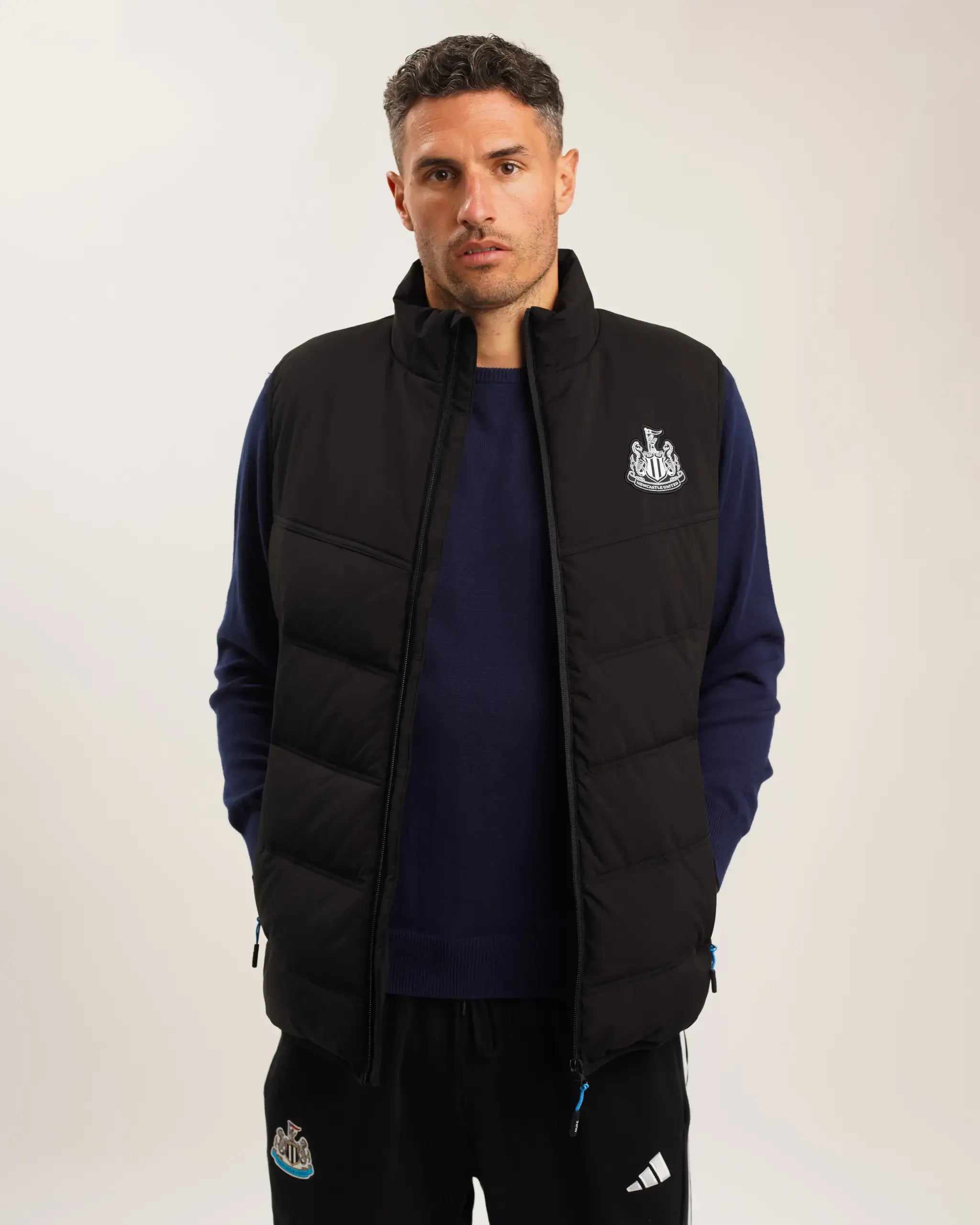 men's bomber jacket with contrast stitchingNewcastle United Men's Black Padded Gilet