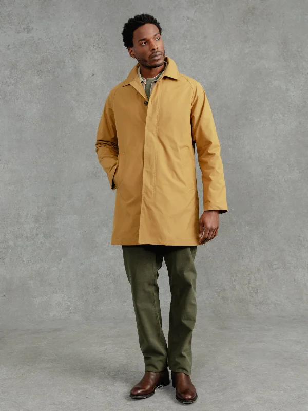 men's denim trucker jacketThe Ventile® Raglan Raincoat - Yellow Ochre