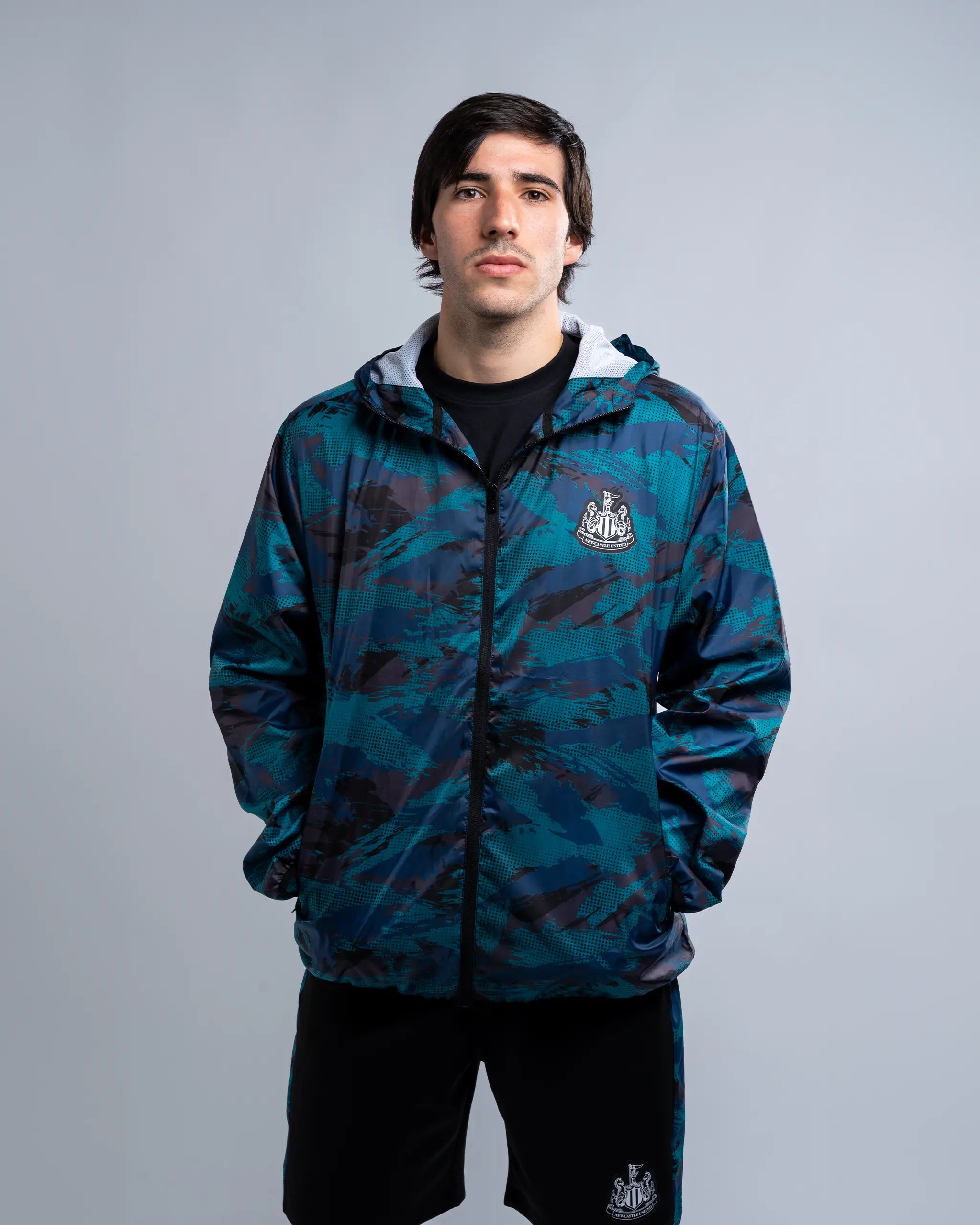 men's bomber jacket with adjustable sleevesNewcastle United Camo Poly Lightweight Shower Jacket